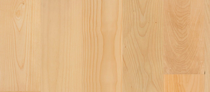 Natural light cream Canadian Maple hardwood flooring sample displaying a smooth, dense, and durable wood grain structure.