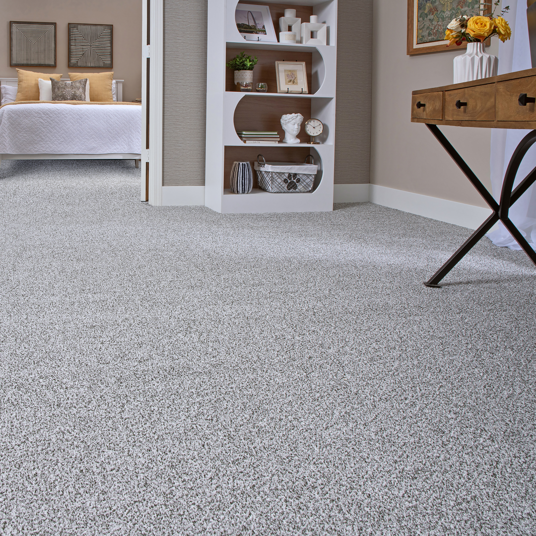 Soft gray carpet flooring in a bedroom and adjoining hallway